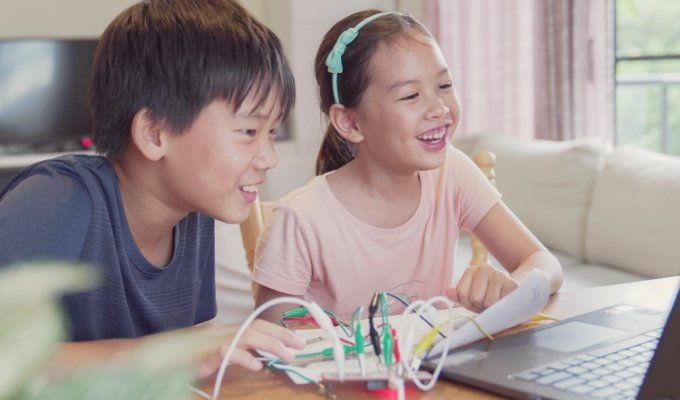 Student building project with block-based coding tools